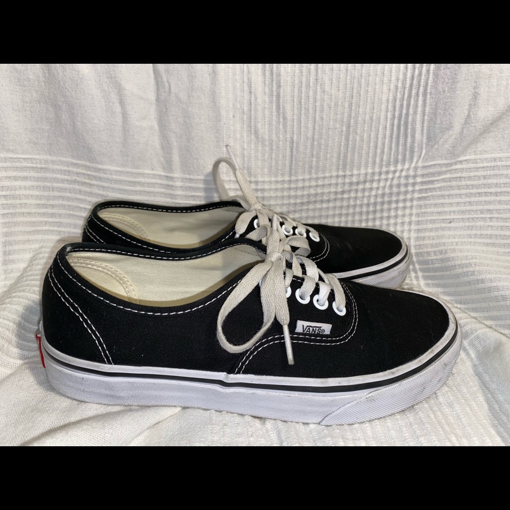 Black Vans lace up shoes